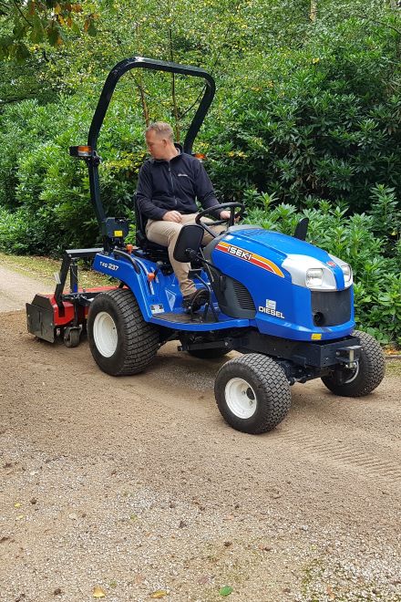 Tractor-mounted Kersten gravel path renovator