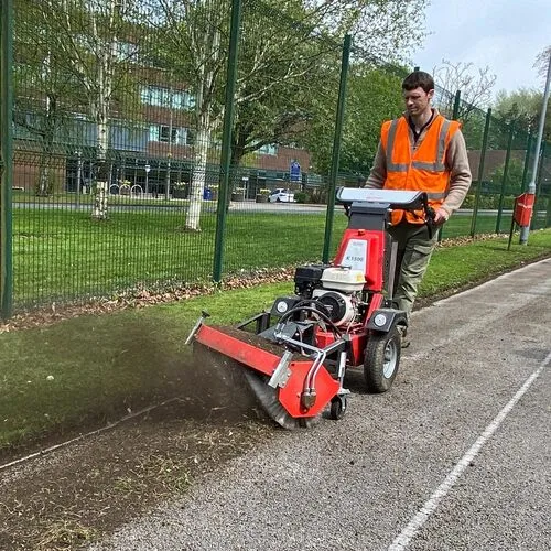 Pedestrian EFKM Sweeper sweeping