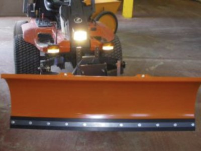 Kersten snow plough fitted to the front of a Kubota F-Series mower