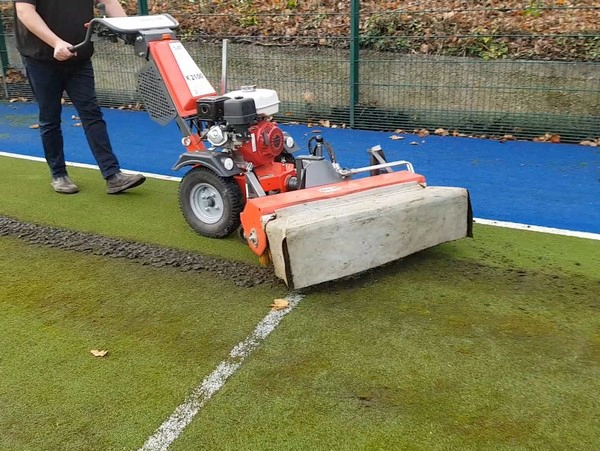 Maintaining synthetic sports surfaces with Kersten sweepers - Cover Image