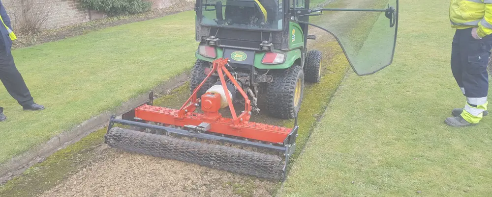 Kersten pedestrian gravel path renovator working on a gravel path