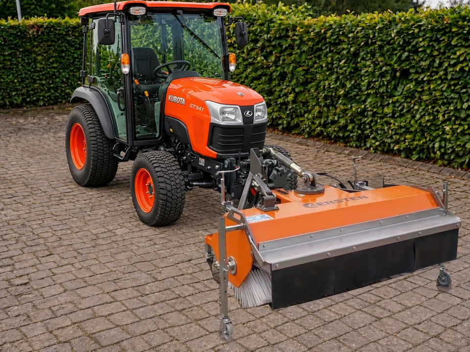 Kersten KM45 front sweeper with brush guard on a Kubota ST341